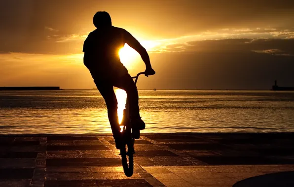 Picture sunset, bike, guy
