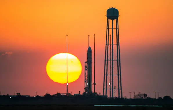 Picture the sun, sunset, rocket, NASA, spaceport, Antares