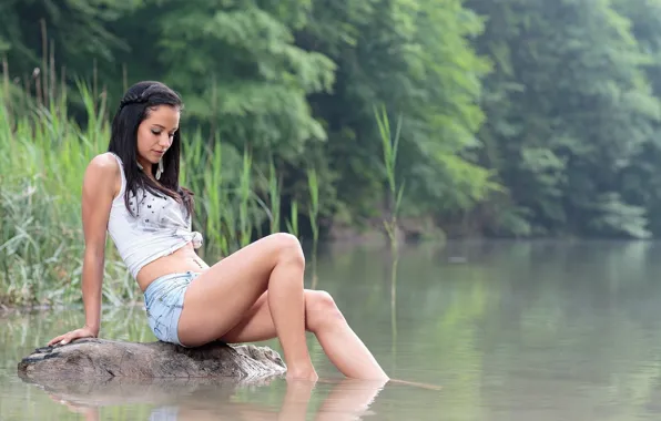 Picture grass, water, girl, river, shorts, brunette
